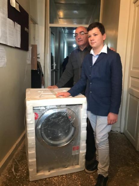 Levani with the Director and washing machine